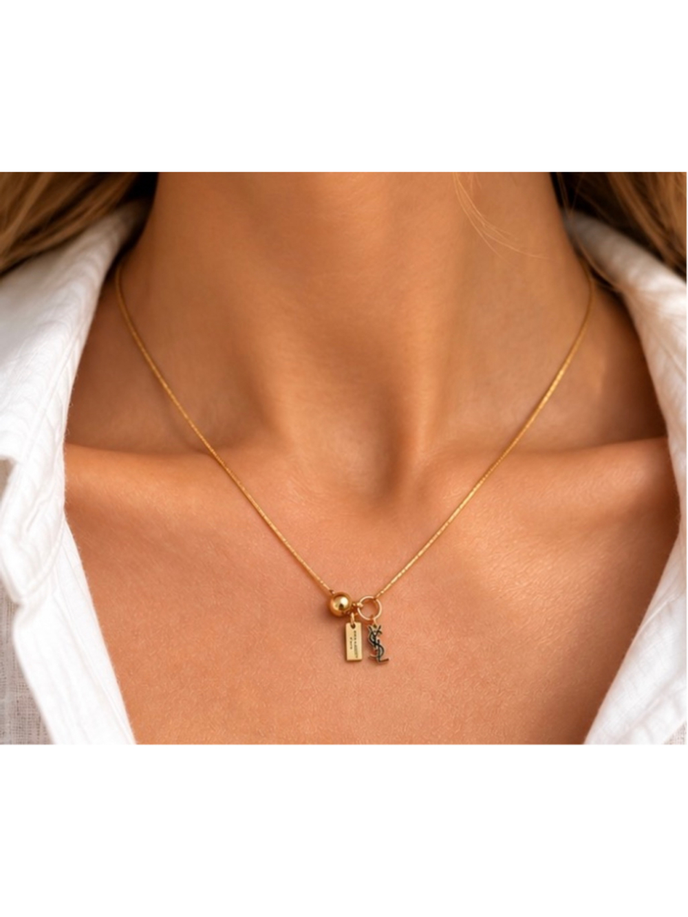 YSL Saint Laurent Necklace Gold and Black Logo Charm